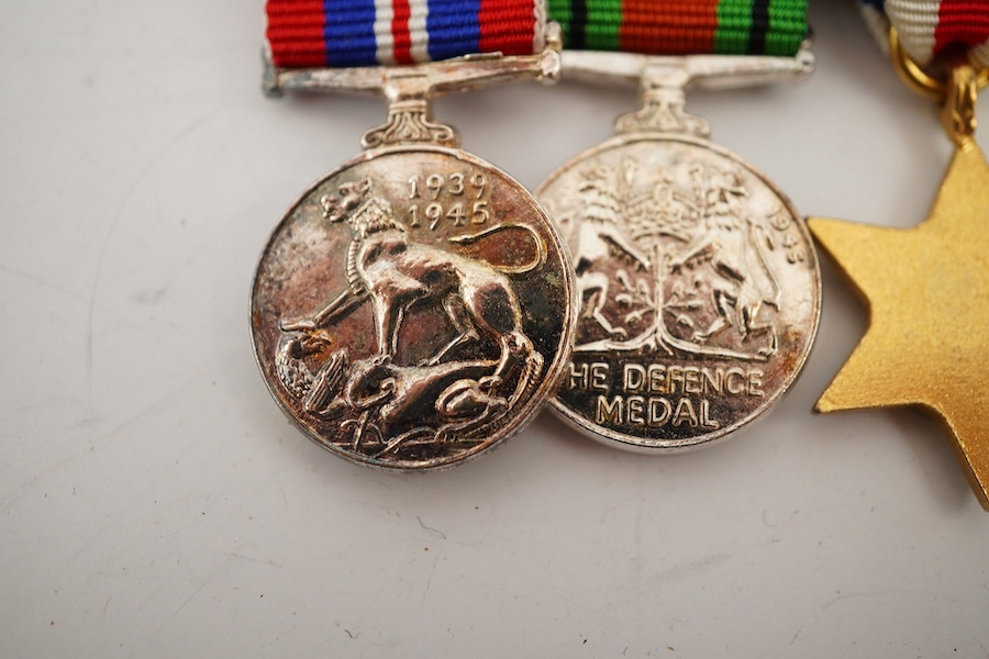 A First World War George V Bravery in the field medal awarded to CPL. R.E. Cox 11th Royal Sussex, a Second World War trio and miniatures, a Masonic medal, etc. (11). Condition - fair to good.